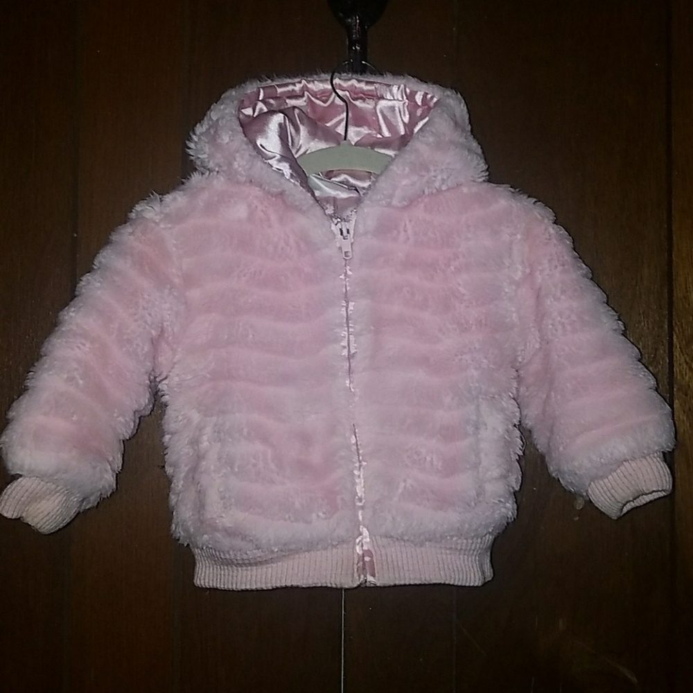 Bundle your little one in this gorgeous fur coat